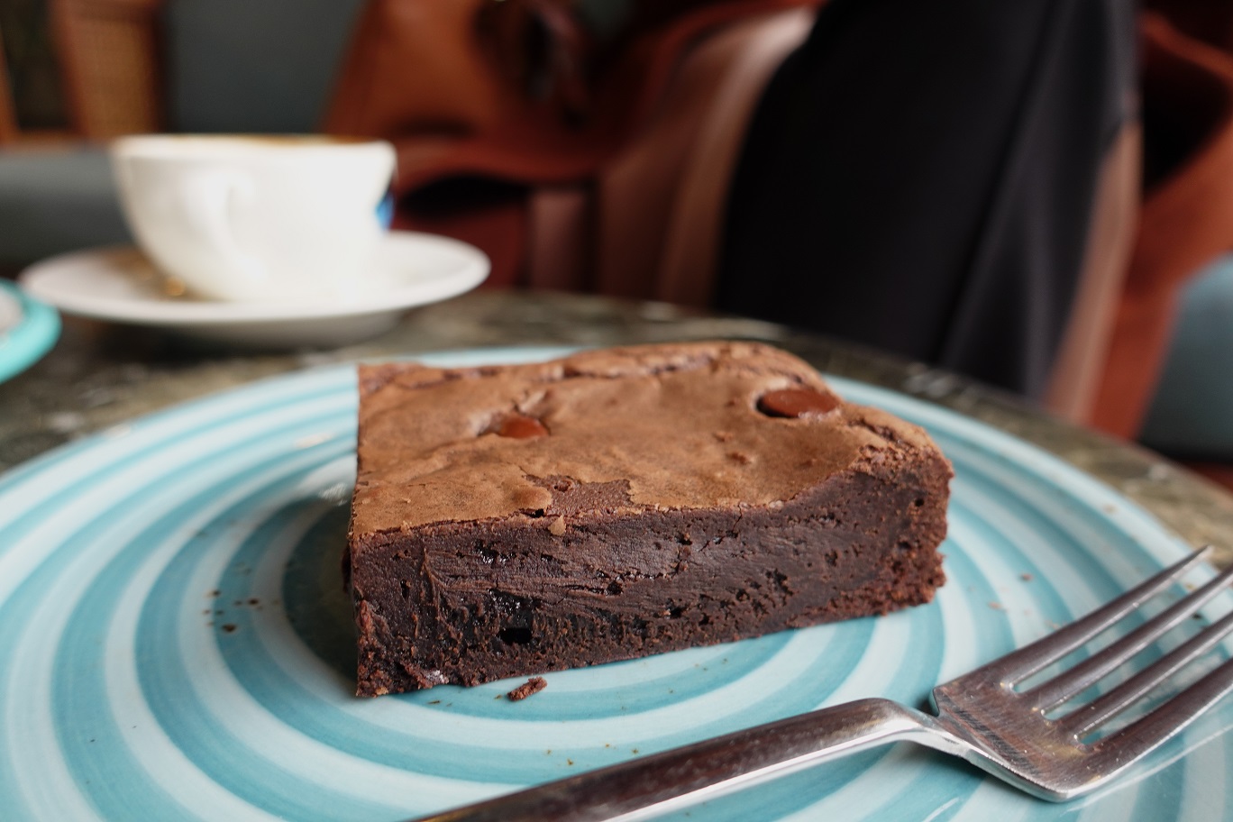 slice-of-brownie-on-plate-on-table-2024-12-13-08-42-03-utc.jpg